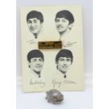 An Official Beatles Fan pin badge and a Beatles novelty charm