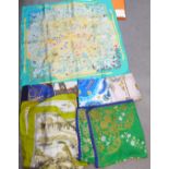 A collection of seven Hermes scarves; one boxed and six others including 'Paris, London, 1850, Les