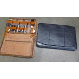 A gentleman's travel case, hair brushes, comb, jars for soap, cream, scissors, etc., in pigskin, and