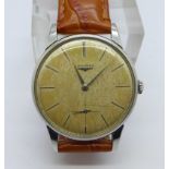 A Longines manual wind wristwatch with sub second dial, long service inscription to case back