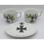 Two cups decorated with German cross medal, acorns and ribbon, and a later oval dish