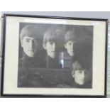 A Beatles print from the album cover With The Beatles