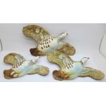 Three Beswick pink legged partridge wall plaques, one a/f