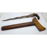 An Indonesian kris with wooden scabbard (scabbard repaired), blade 34cm