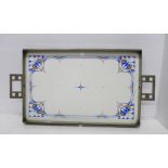 A serving tray with Art Nouveau ceramic tile