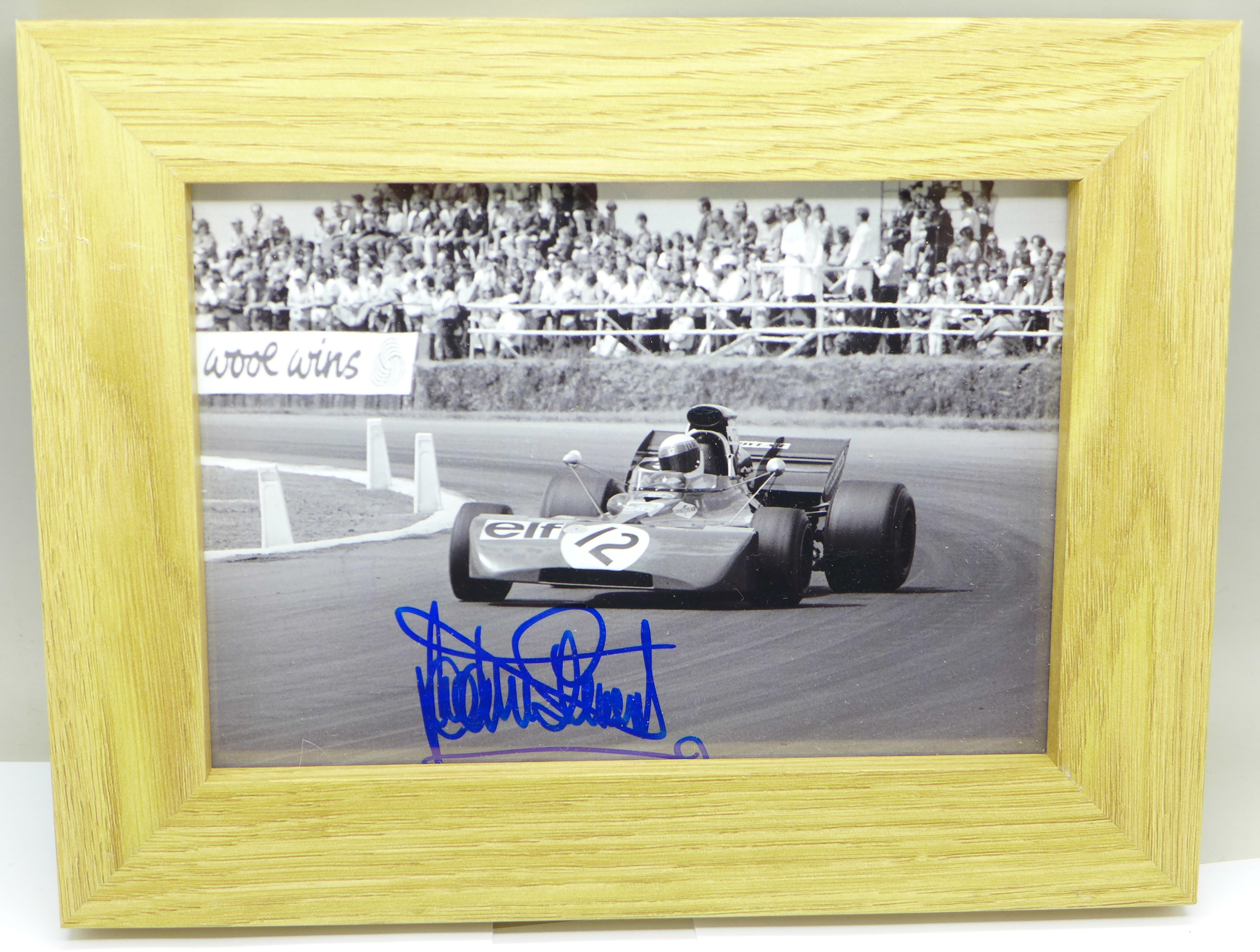 A framed signed photograph of triple Formula 1 World Champion, Jackie Stewart