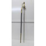 A continental sword with leather and brass scabbard, gilt brass handle, length of blade 79cm