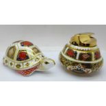 A Royal Crown Derby 1128 pattern table lighter and a turtle paperweight, (2)