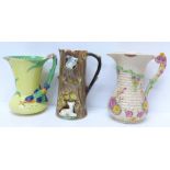 Three pottery jugs, Brentleigh, Arthur Wood and one other