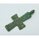 A medieval Byzantine bronze cross with depiction of a saint