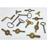 Fourteen assorted clock keys including a crank handle and one in the form of a bird