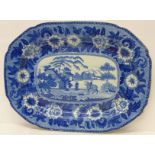 A 19th Century blue and white chinoiserie platter decorated with Chinese scene, 43.5cm