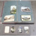 A postcard album and postcards