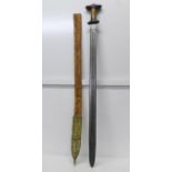 An Abyssinian gurade sword, with etched blade and horn handle, blade 80.5cm, leather and gilt