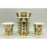A pair of small Royal Crown Derby 1128 pattern vases and one other vase, pair 63mm