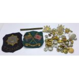 A collection of mainly uniform buttons, a South African Railways badge, a S.A.R & H. Police and