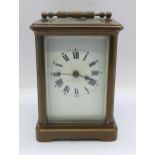 A French brass and four glass sided carriage clock