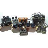 Eight pars of binoculars, cased, including Chinon Countryman 7x35
