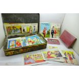 A tin of seaside humorous postcards (approximately 130)