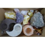 A collection of amethyst, yellow calcite and other crystals, etc.