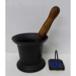 A pestle and mortar and an enamelled ashtray set