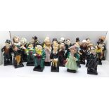 A collection of twenty-four Royal Doulton Charles Dickens character figures