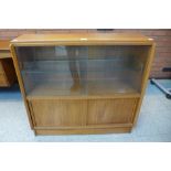 A pair of teak bookcases