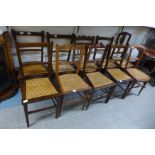 Ten Edward VII mahogany and walnut bergere seated chairs