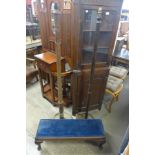 An early 20th Century mahogany and upholstered stool and two standard lamps