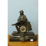 A 19th Century French Belge noir mantel clock, mounted with spelter figure of Raphael, the