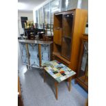 A teak display cabinet, bookcase, coffee table and a china cabinet