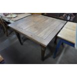 An oak draw-leaf table