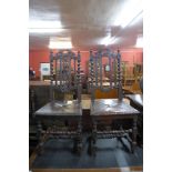 A pair of Jacobean Revival carved oak chairs a/f