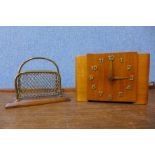 An Art Deco electric mantel clock and a letter rack