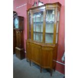 A late Victorian Sheraton Revival inlaid satinwood display cabinet, 224cms h, 126cms w, 45cms d.