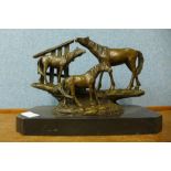 A bronze figure group of a horse and foals, on black marble plinth, 21cm h