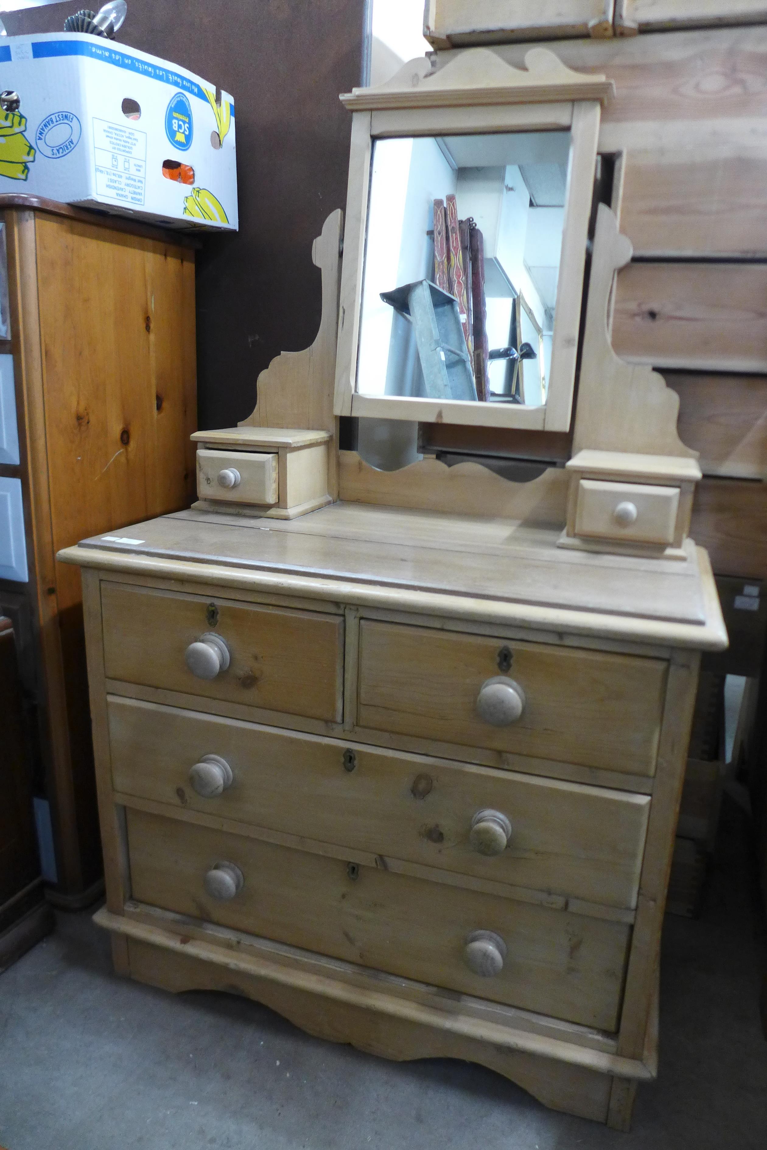 A Victorian pine dressing chest