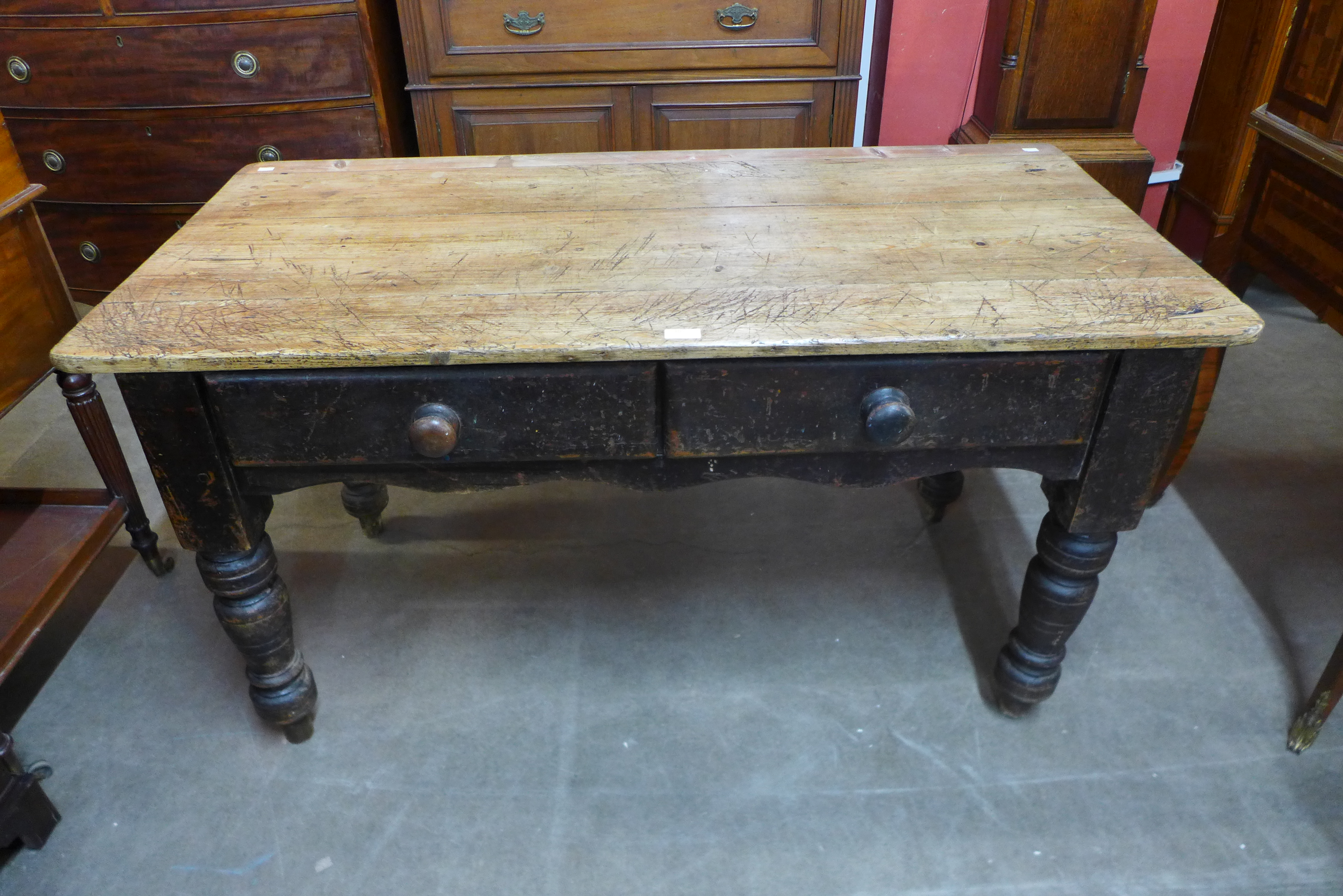 A Victorian pine scrub top two drawer farmhouse kitchen table, 73cms h, 133cms L, 66cms w.