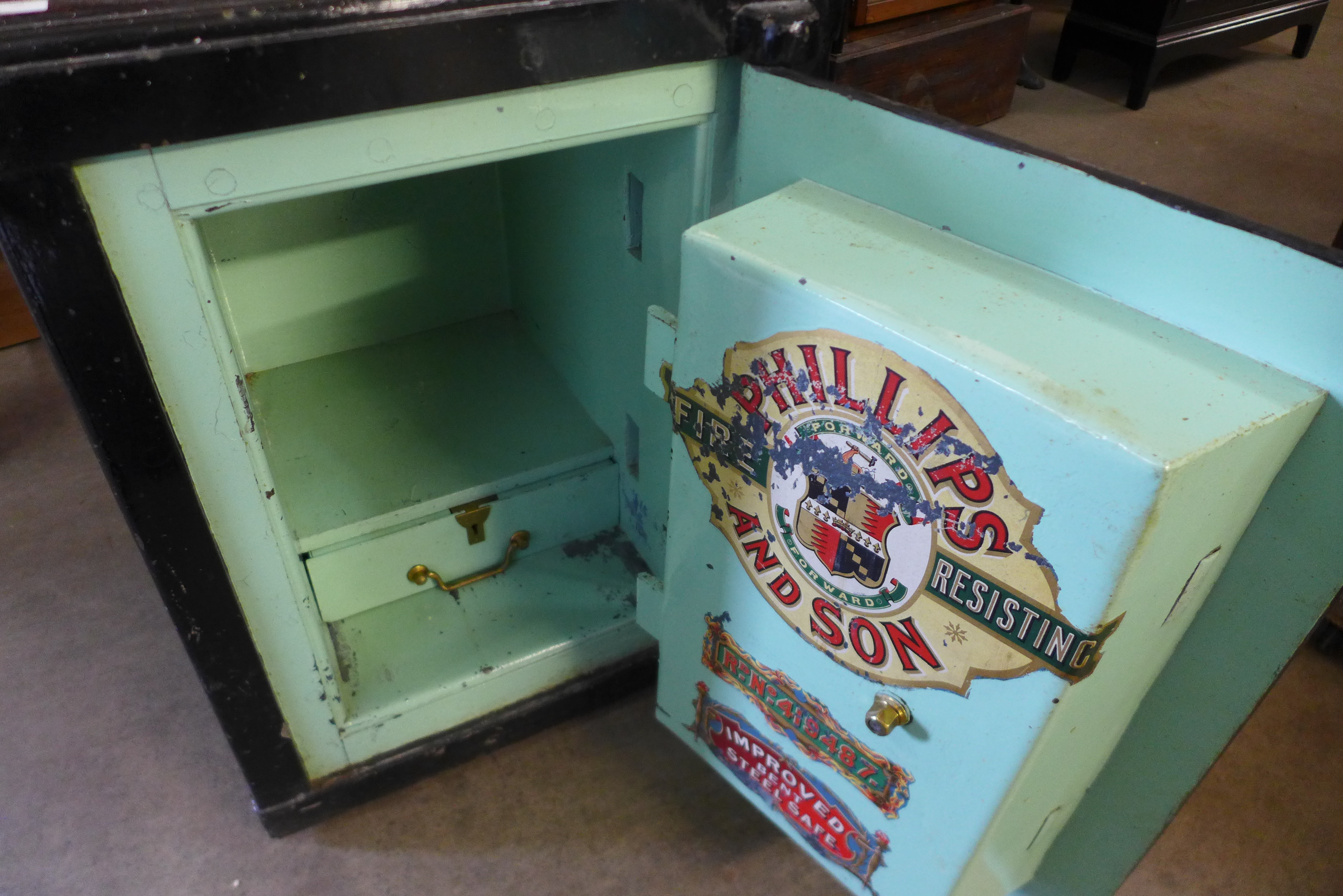 An early 20th Century Phillips and Sons, Birmingham steel fire resistant safe (with key) - Image 3 of 3