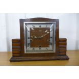 A Smiths Enfield oak mantel clock