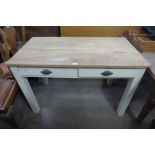 A Victorian painted pine two drawer desk