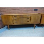 A Beautility teak sideboard