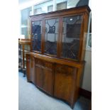 An inlaid mahogany bookcase ( with associated top)