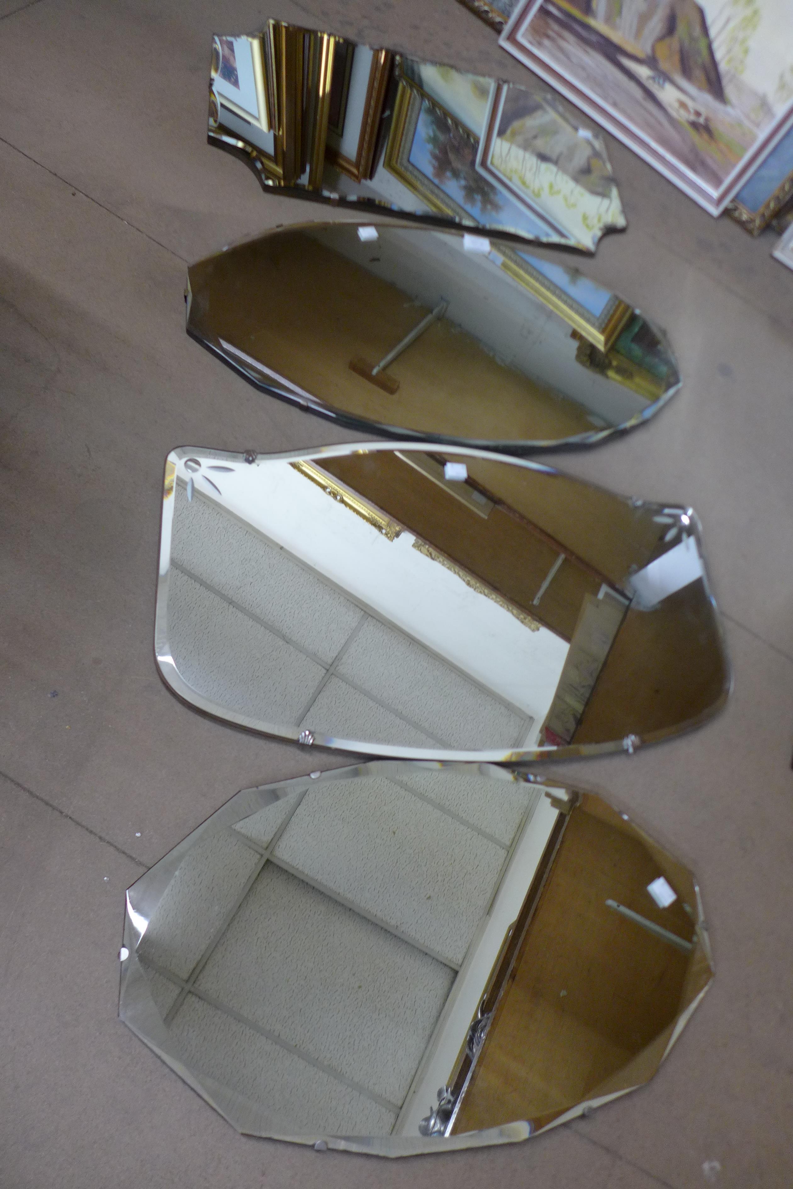 Four frameless deco mirrors