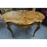 A Victorian burr walnut and ormolu mounted serpentine centre table, 76cms h, 130cms L, 87cms w.