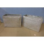 A pair of galvanised Walls Ice Cream tubs
