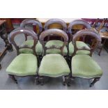 A set of six Victorian mahogany dining chairs