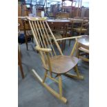 An Ercol Blonde elm and beech Goldsmith rocking chair