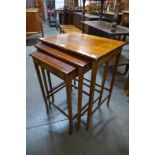 An Edward VII mahogany nest of tables with single drawer