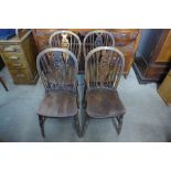 A set of four Victorian elm and beech wheelback chairs